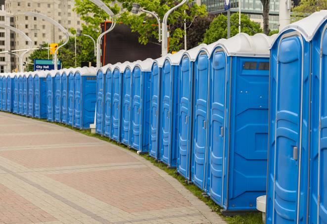 a line of brightly-colored portable restrooms, perfect for outdoor festivals and concerts in Laguna Niguel, CA